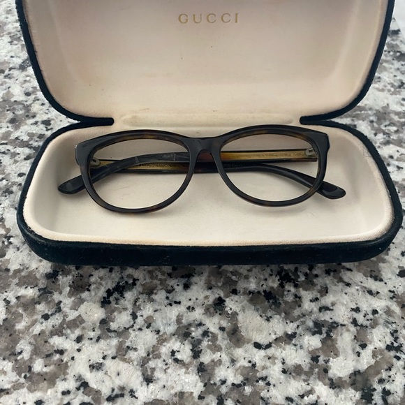 Brown colored Gucci frame with case. - Picture 2 of 4